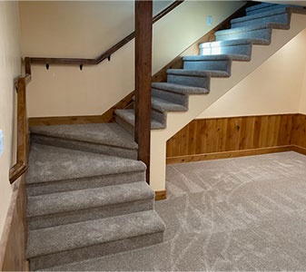 Carpet and hardwood staircase by Gundersen's